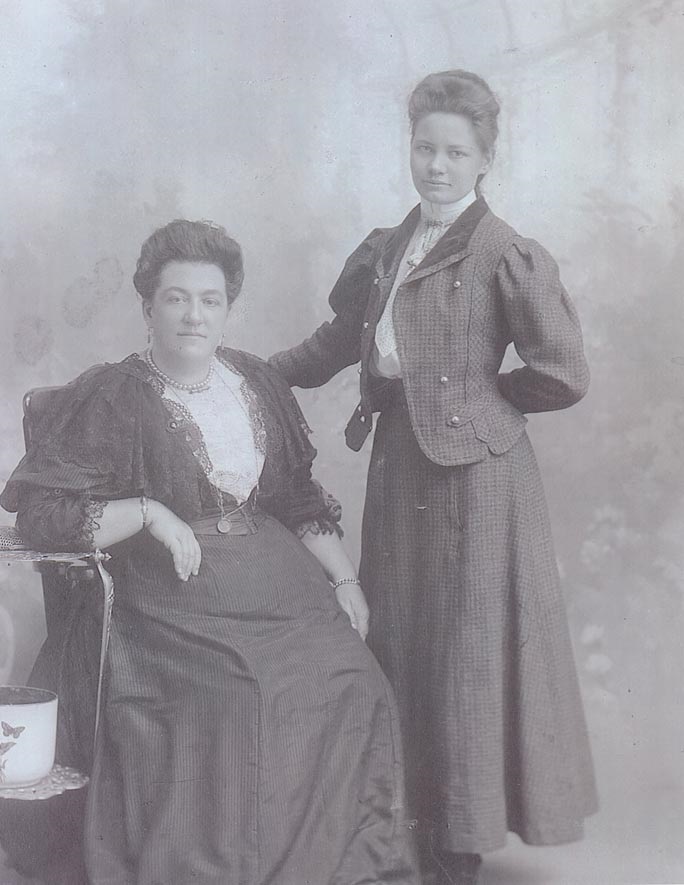 Lulu Benstead (Standing) with her music teacher.