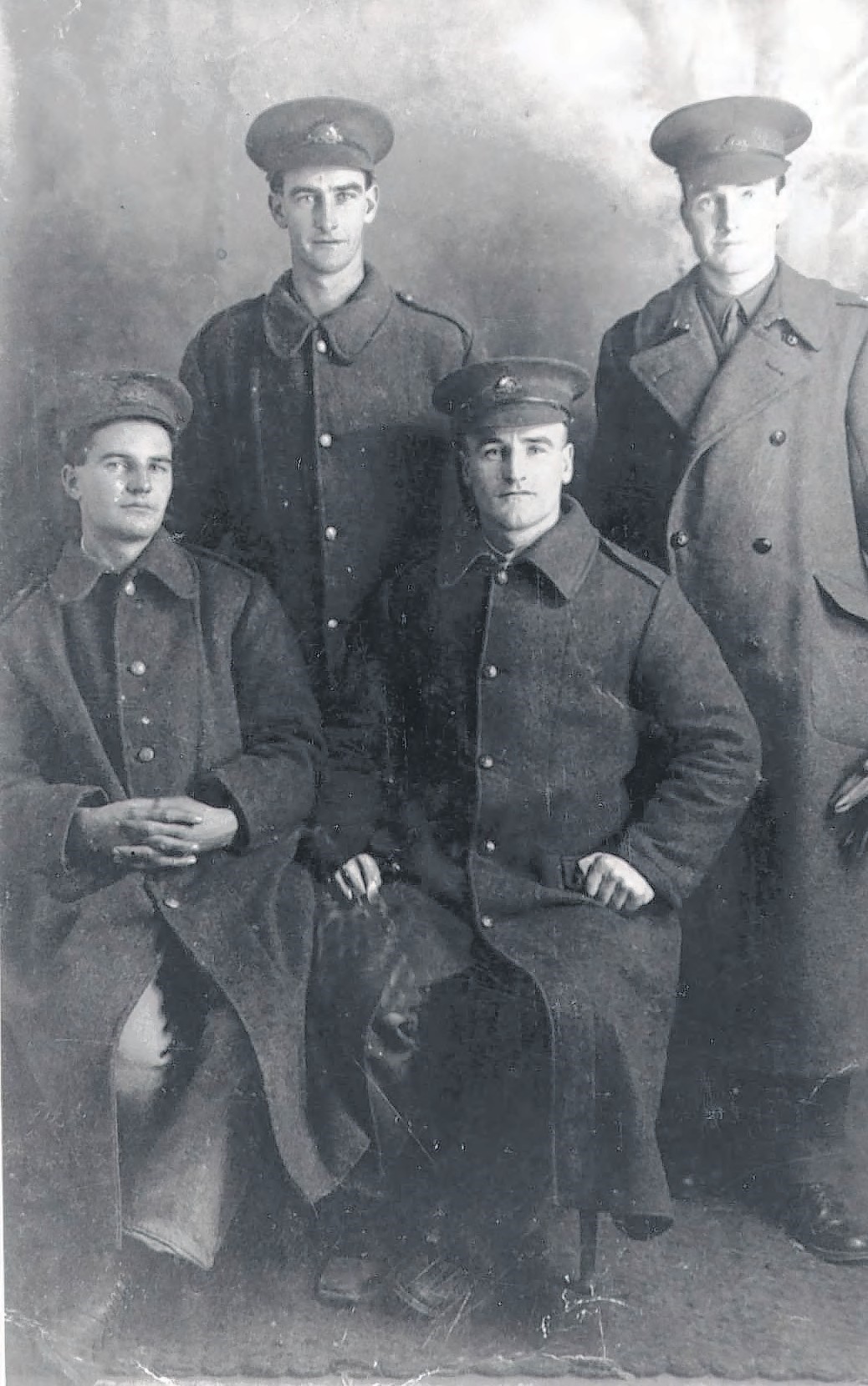 The Hallahan brothers Robert (standing, left), Walter, Alf (seated, left) and Wendell. The four, who were in London at the same time, had just been to see a West End production when they decided to have this photograph taken to send to the family in Kalgoorlie.