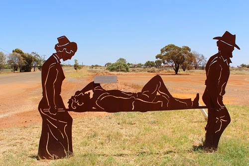 Metal 'Cut out' sculpture at Menzies depicting a mine accident.