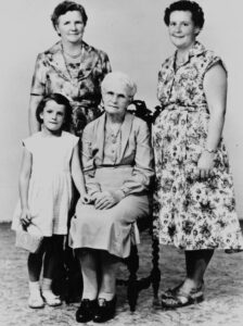 Four Generations- Left to Right- Josephine Eva Spain, Great Grandmother Fish, I think her name is Elizabeth. Eva Powell (nee Fish) Beryl Anne Spain (nee Powell). Taken in 1958.