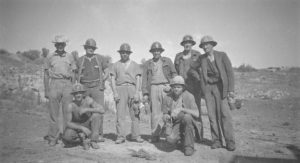 Taken at the Lake View and Star mine in 1948. Milton Spain bottom left squatting.
