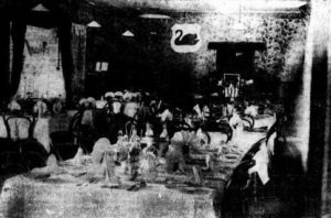 The dining room at the New Kennedy's Hotel, note the black swan on the rear wall.