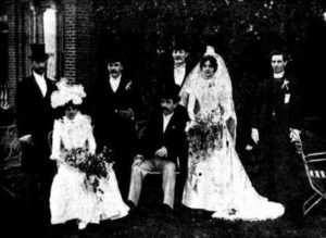 Starting on the left the group are -Mr. J. S. Tanner, Miss Hetty Fitzgerald (bridesmaid). Mr. T. H. Nolan (best man), bride and bride-groom. Mr. E. P. Plummer, the Rev. Father O'Gorman.