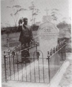 Henry at the grave of his brother Adolphus - Raising his hat in salute