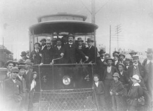 The First Tram 20 May 1902 - Mr Stanley holding the lever.