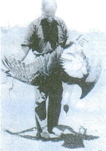 Some sport on the overland route - A wild turkey shot with a revolver from the seat of the moving car.
