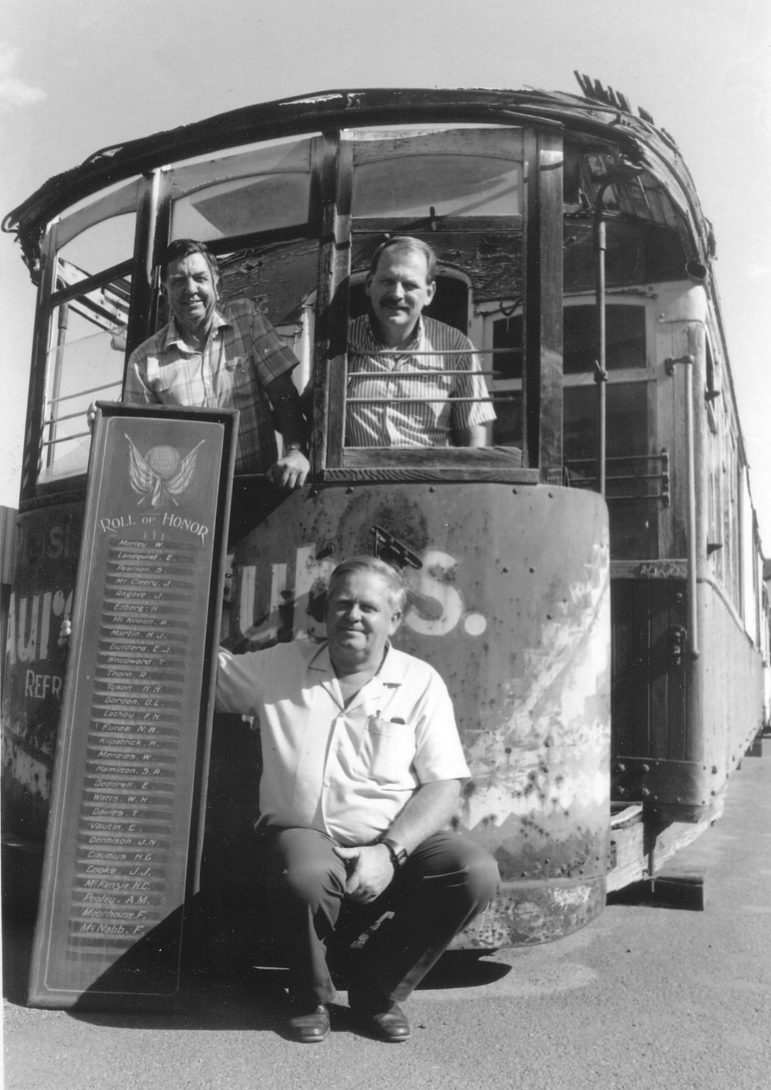 Founders of the Perth Electric Tramways Soc Inc Mr L Richardson and Mr R Francis hand over the WW1 Honour Board of Tramway men in the Great War to Greg Brown for the E.G.T.B.
