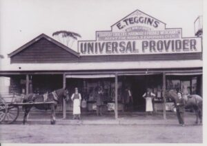 Teggins Store Kunanalling with Tom Coward outside
