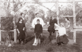Rustic arch to tennis courts Terraced Garden – Wooroloo