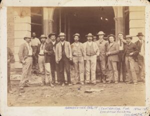 Henry Bilton ABBOTT 5th from left in fromnt of the Coolgardie Chambers 1894-5.