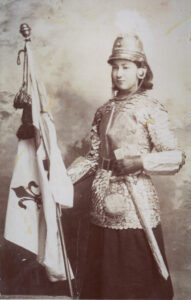 Lila Smetherham dressed as Joan or Arc in the Armistice parade.