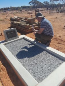 Keith Dodd beside his Great Uncles grave - Photo Gail Dodd