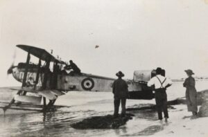 The photo with the plane is of the first flight around Australia. They landed at Israelite Bay. McKintyre was the name of one pilot.