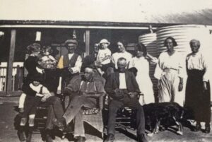 The man sitting in the wicker chair in the lower photo is German Henry Dimer who jumped ship during WW1 and married a local woman named Topsy. My grandfather is to the left with his arm around my father Jack - Photo Michael Loney