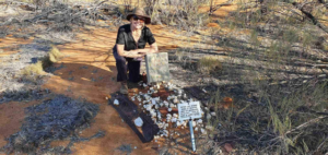 Lynnette Oliver, Great Granddaughter of Mary Byrne at the grave of 