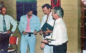 Life Membership Awards being made in 1977 to Ian Wake, Steve Bastow and Gordon Dobson by Dave Eames in the Golf Club (Dave Eames)