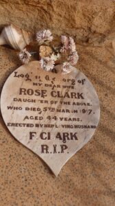 Memorial plaque on grave of Bridget McCabe for her daughter Rose.