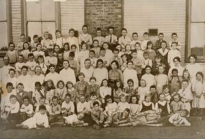 Leonora School 1916 – Lila Bux third row from the bottom, third from the left and Dora Bux, fourth row from the bottom, third from the right.