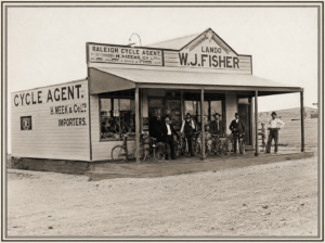William James Fisher is the man in the middle with the moustache- Nannine Cycle Agency and Timber yard 1900. - Photo Robin Panousieris