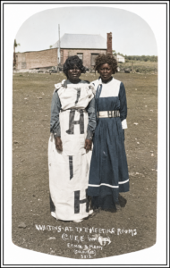 Two Aboriginal girls wearing advertising for Lake Way Station. 1900 Emily and Mary - Robin Panousieris.