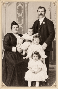 John Watts GREGSON and Amelia nee LANCASTER with children: front Lily, behind Ethel and baby Ivy - Coolgardie 1901 - Image Ancestry.com
